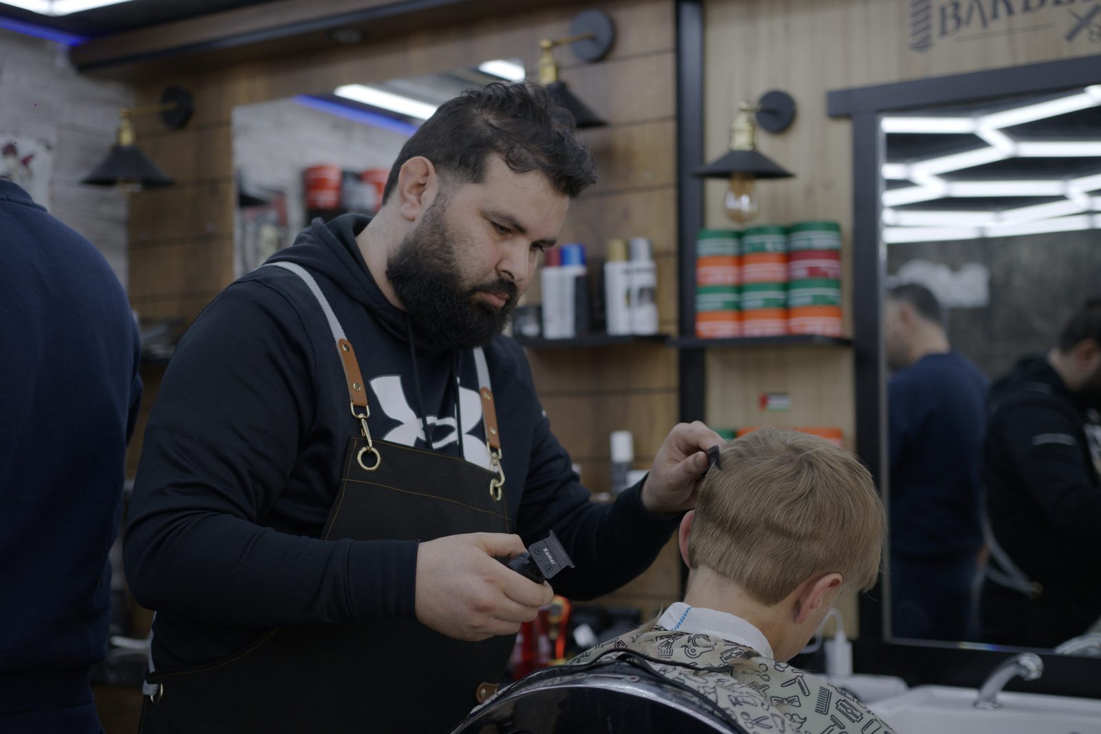 Coupe enfant H&S Barber Thonon — précision aux ciseaux